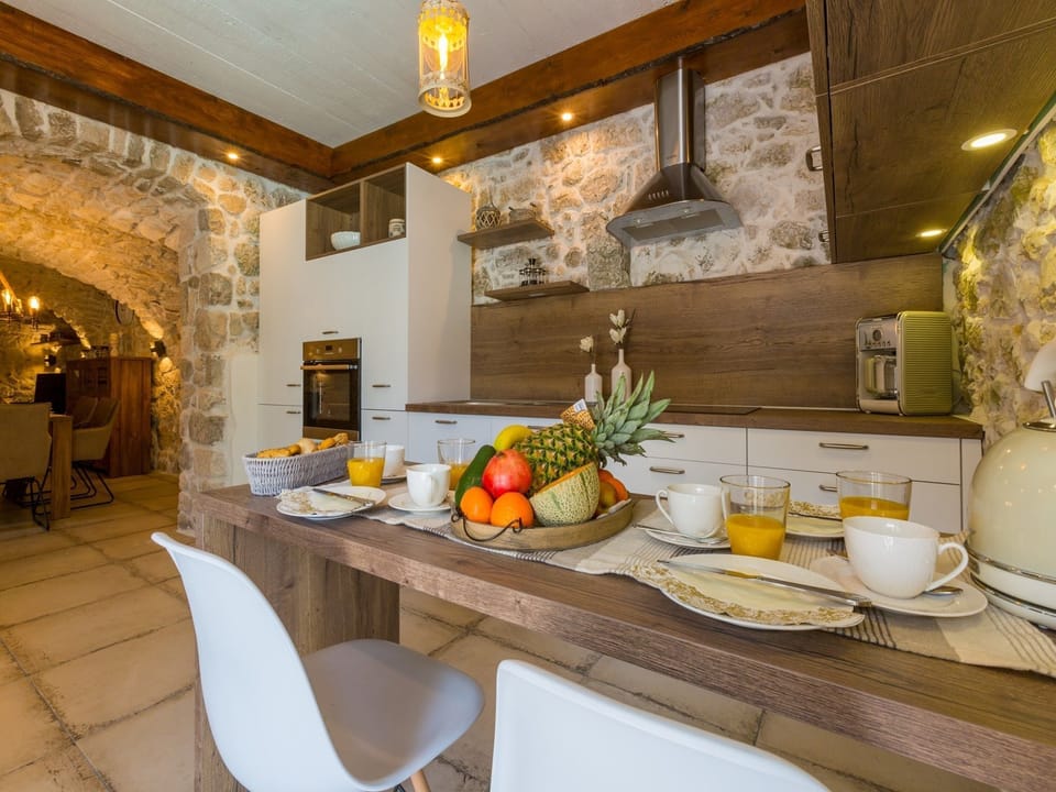 Villa | Private kitchen | Fridge, microwave, oven, stovetop