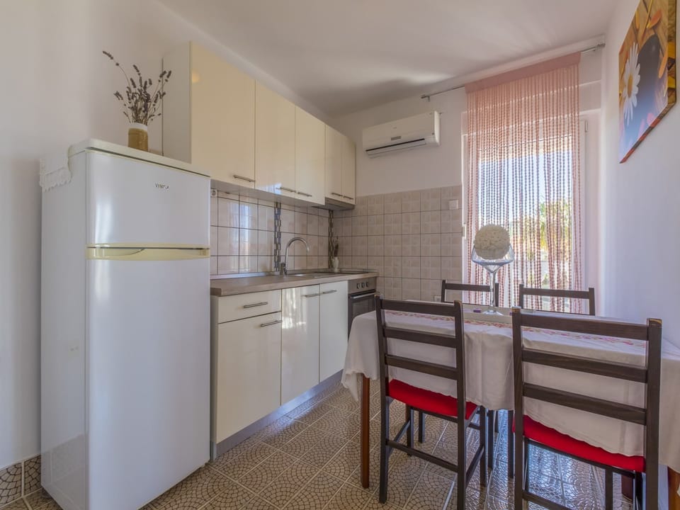 Villa | Private kitchen | Fridge, microwave, oven, stovetop