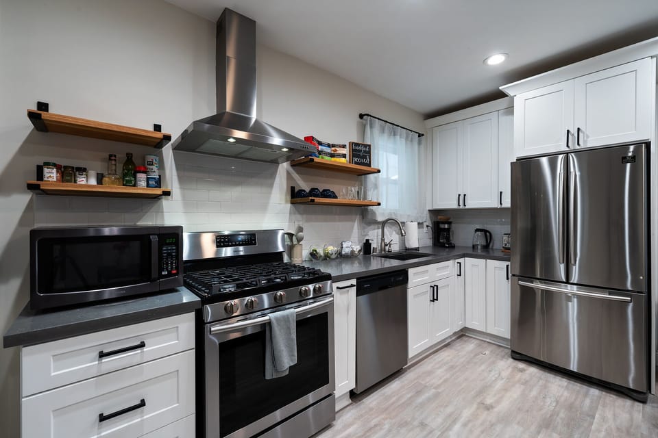 Full kitchen with a coffee maker, water kettle, coffee, teas, etc.!