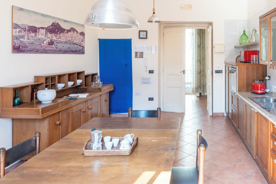 Apartment, 4 Bedrooms | Private kitchen | Full-size fridge, microwave, oven, stovetop
