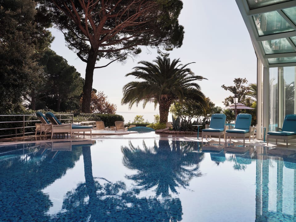 Indoor pool, open 8:00 AM to 9:00 PM, free cabanas, pool umbrellas
