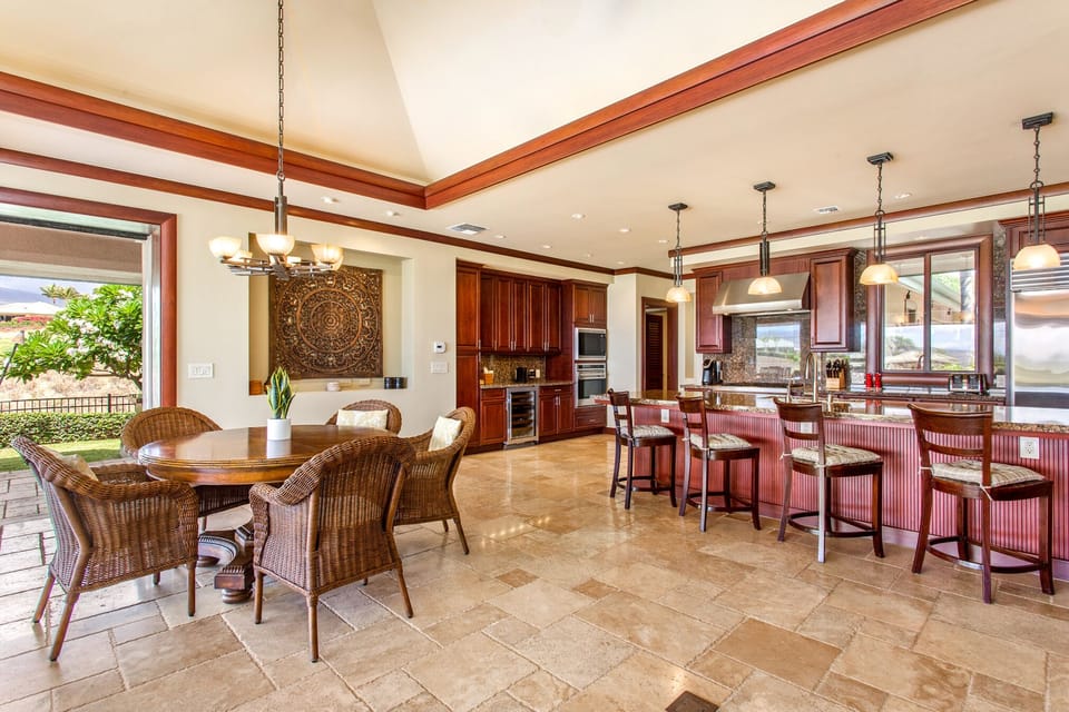 Cook with ease in a fully equipped kitchen featuring Sub-Zero, Wolf, and Bosch appliances.
