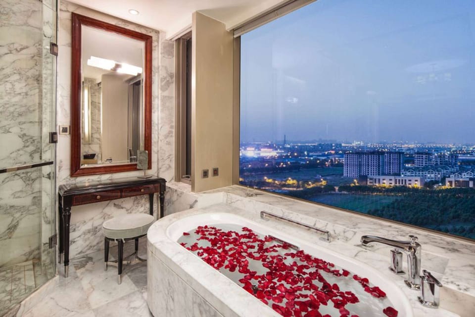 Shower, free toiletries, hair dryer, slippers