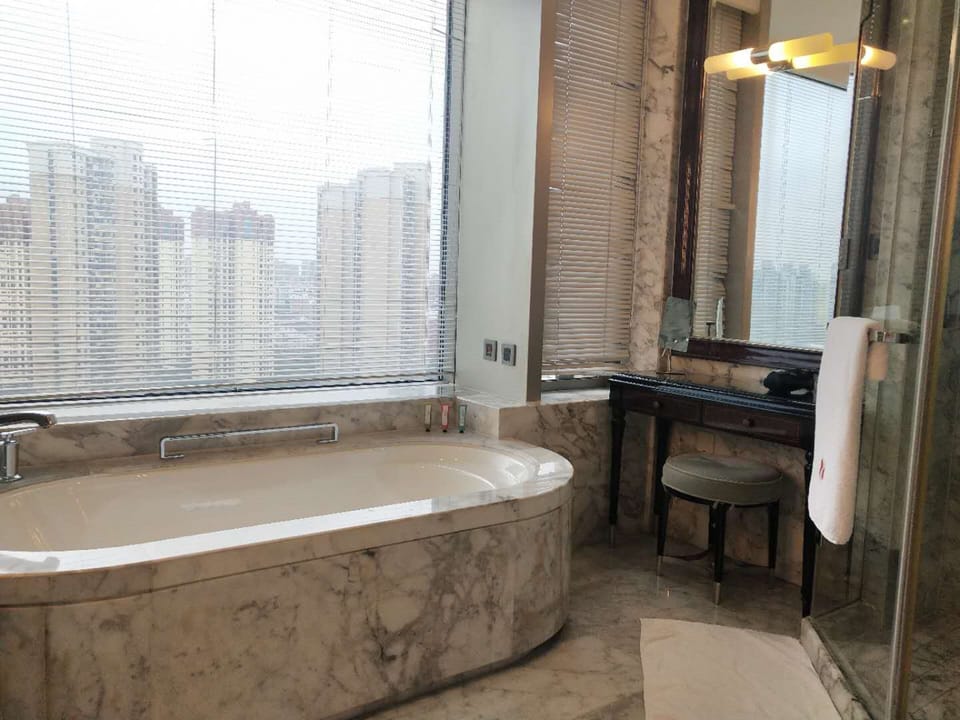 Shower, free toiletries, hair dryer, slippers