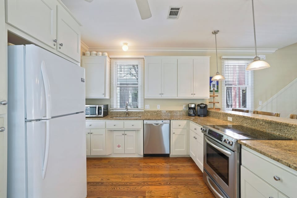 LARGE OPEN KITCHEN, PLENTY OF STORAGE & COOKWARE