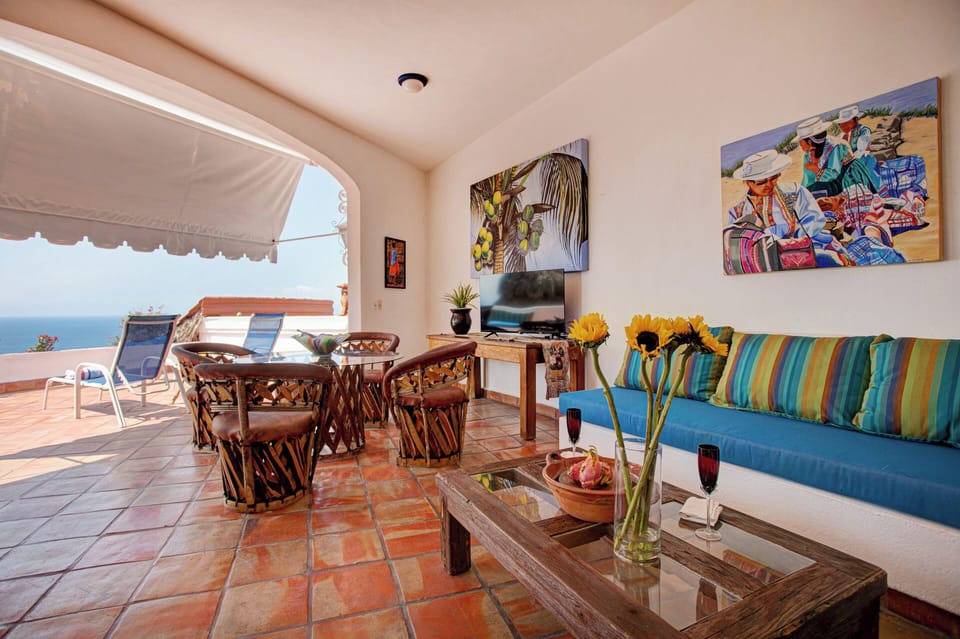 Living room, dining area and terrace