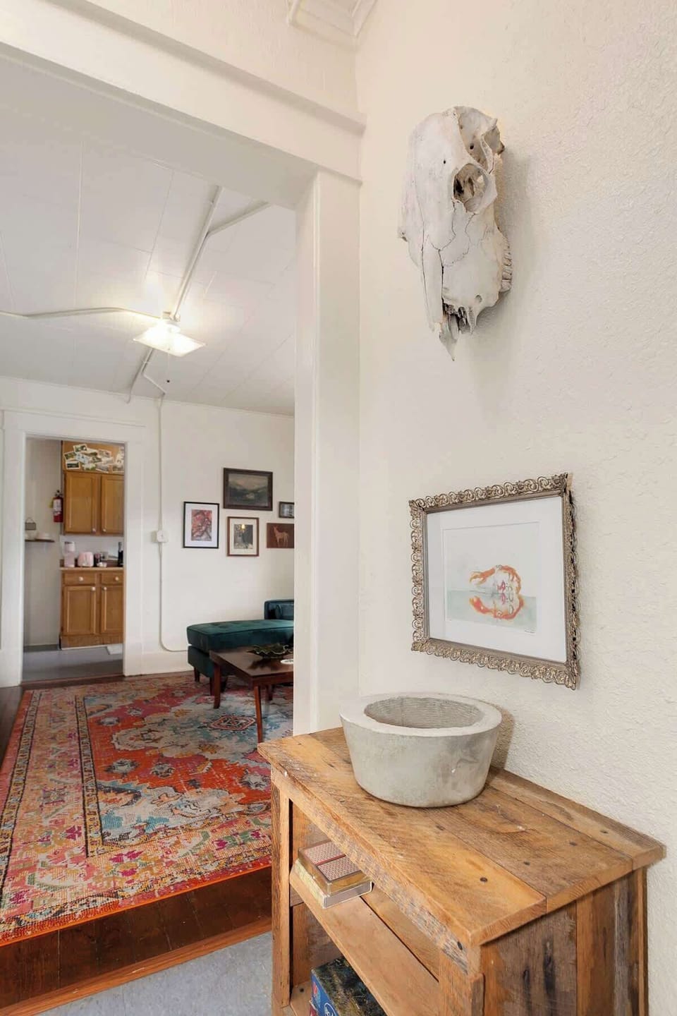 The entry hall of our home. To the left, find the living room, kitchen, master bedroom. To the right find the Queen bedroom & balcony access.