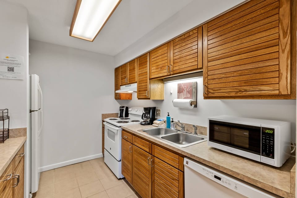 Prepare meals with ease in this inviting kitchen.