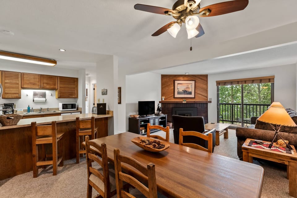Warm wood finishes give this condo a rustic charm.