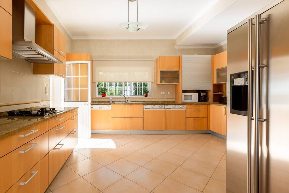 Kitchen area with access to the BBQ area 