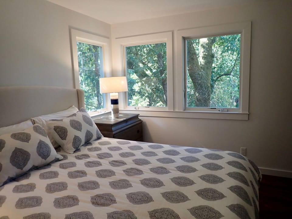 Master bedroom. Quiet, private, with views of shady woodland. 
