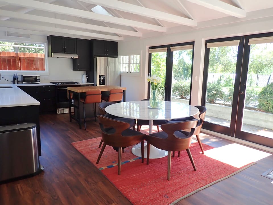 Kitchen/ dining area, next to french doors looking out onto gardens