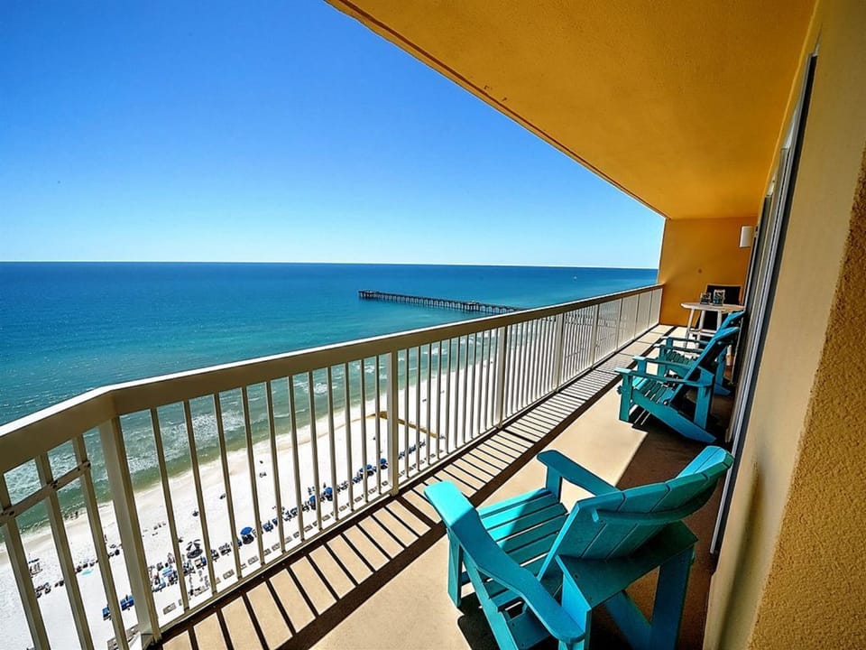 Sip your morning coffee on your private balcony while watching waves roll onto pristine sand below.