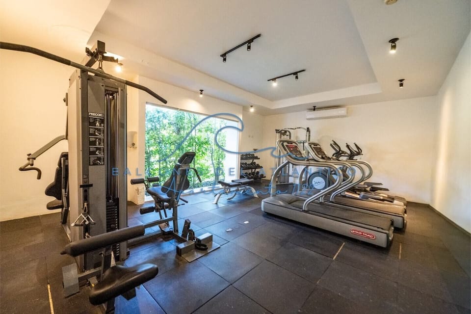 Fully equipped fitness center included with your stay.