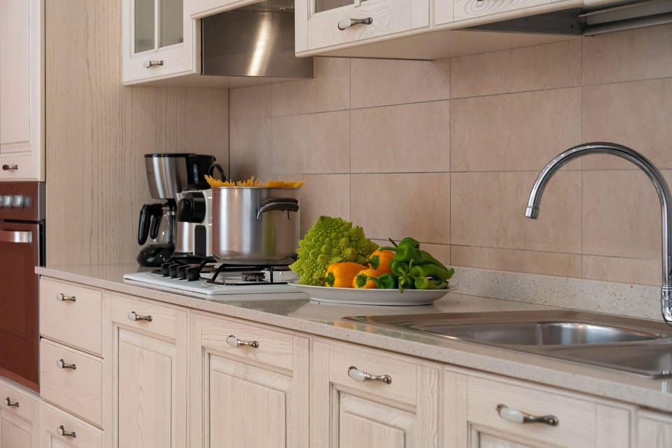 Apartment, 3 Bedrooms | Private kitchen | Fridge, microwave, oven, stovetop