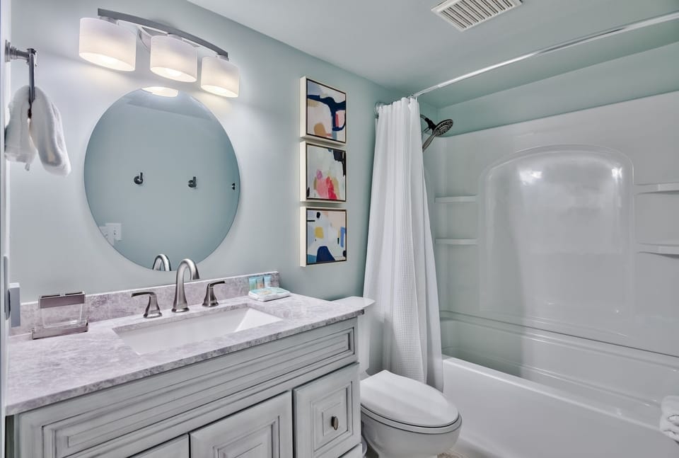 Main floor bathroom w/ shower/tub combo.  Vanity has 2 big, deep drawers too