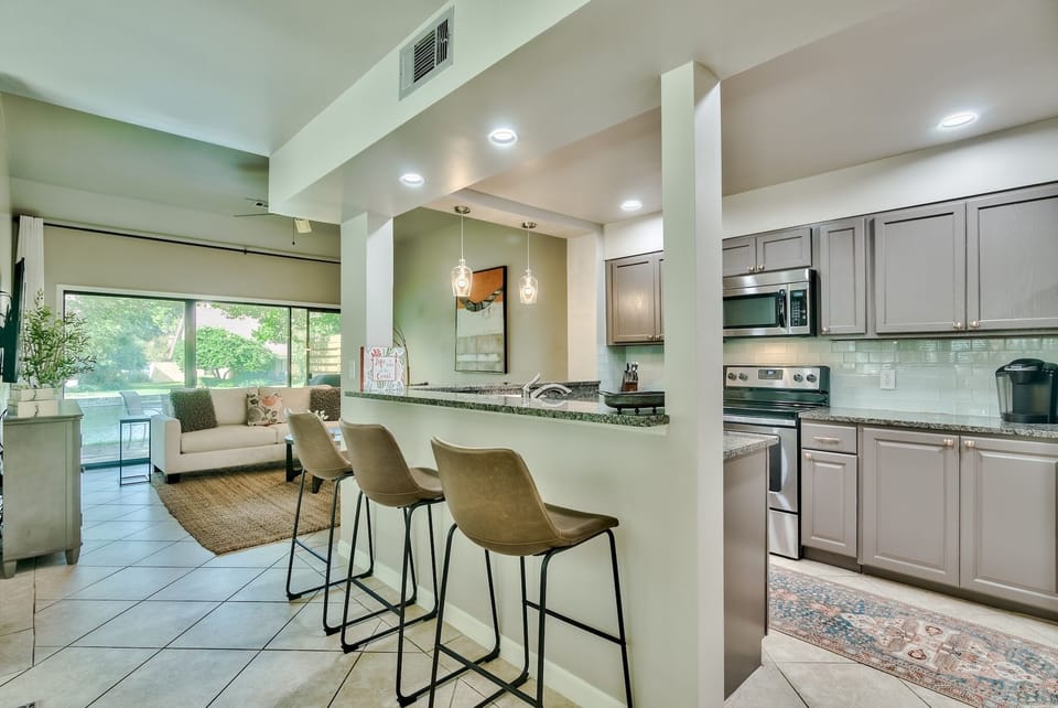 Kitchen and bar area keep you connected at all times.  All lights have dimmers.