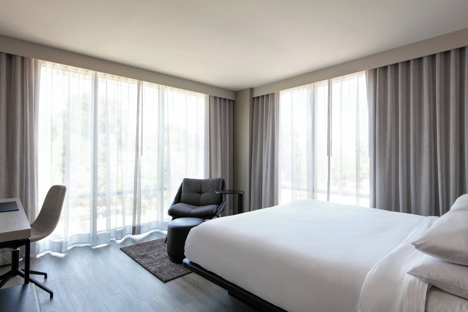 Premium bedding, in-room safe, desk, soundproofing