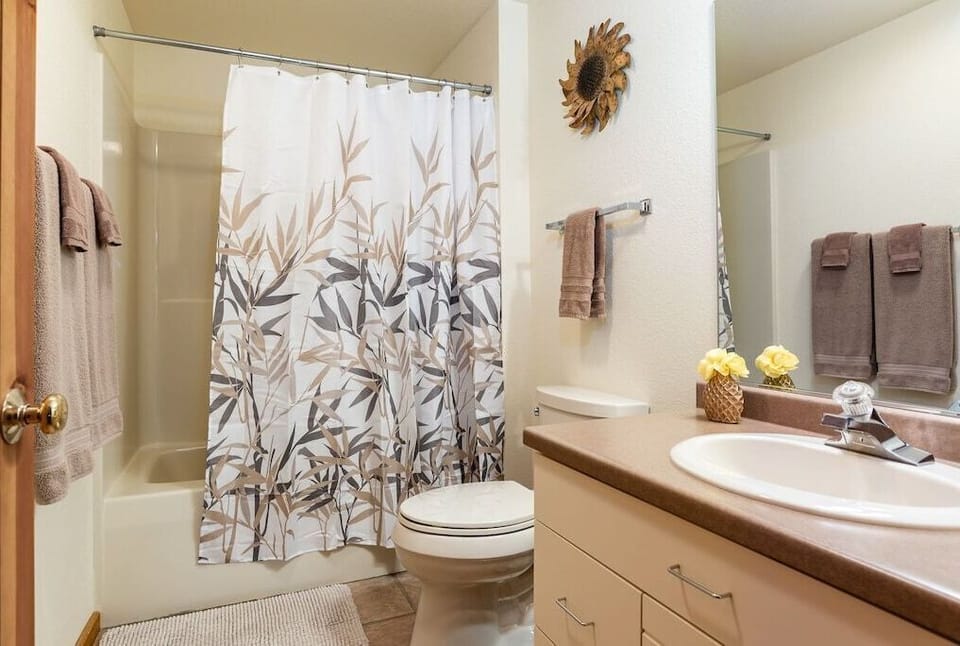 Guest bath with tub/shower located on main floor.