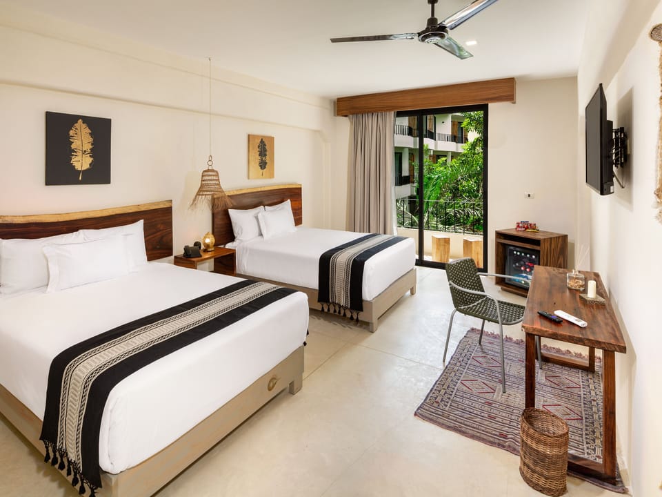 Premium bedding, down comforters, minibar, in-room safe