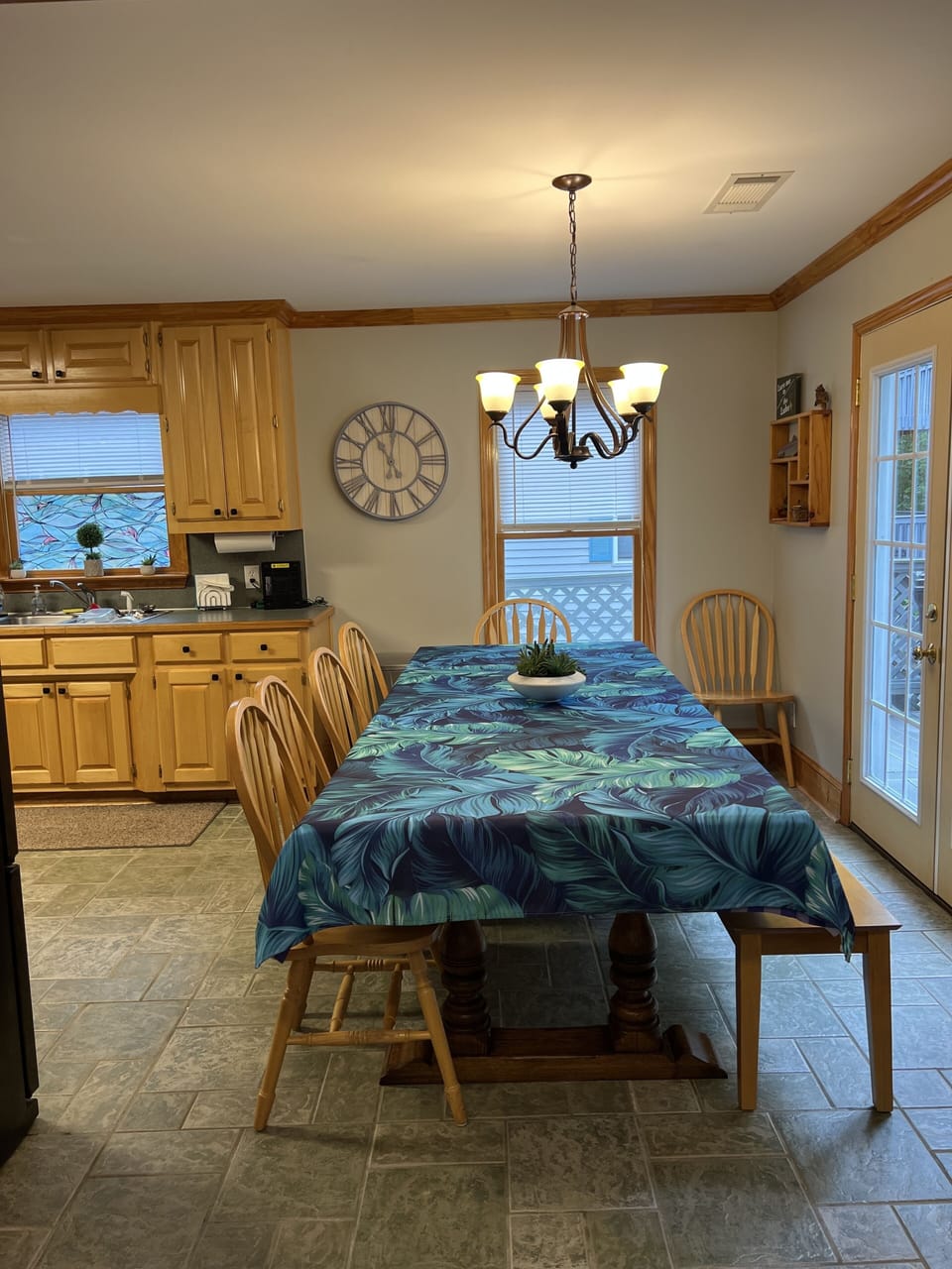 Large dinning table seats 12 plus, we have children’s booster seats. 