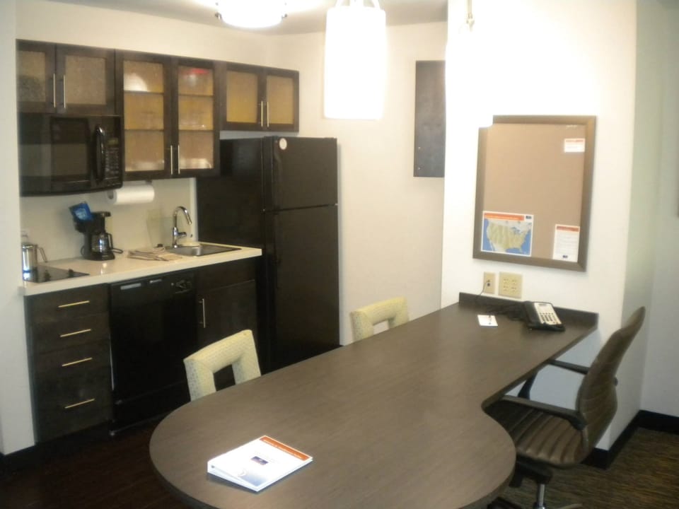 Suite, 1 Bedroom (Living and Dining Area) | Private kitchen | Coffee/tea maker, full-size fridge, microwave, stovetop