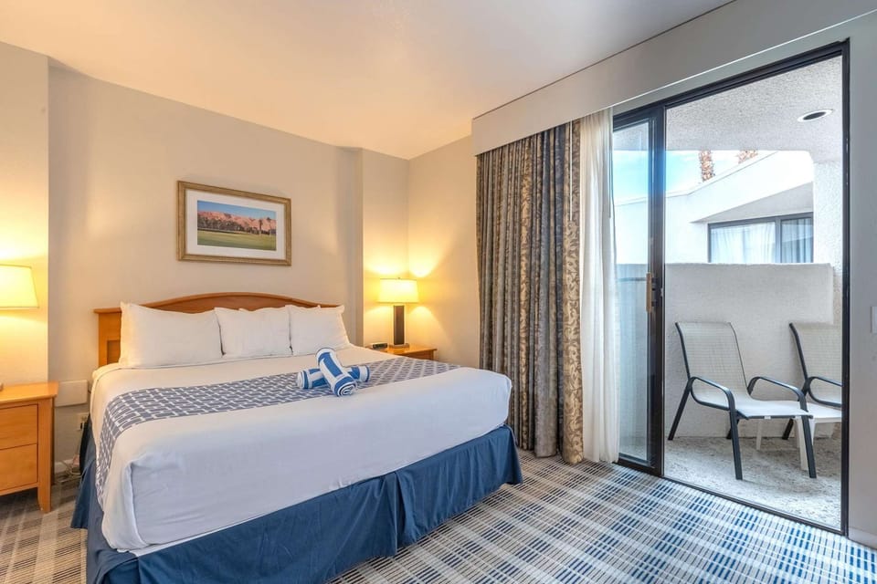 Main Bedroom with King bed, patio, and en-suite bathroom