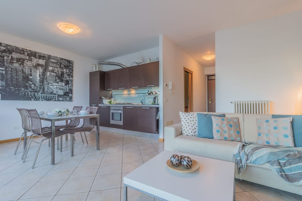 Panoramic Apartment, Lake View | Living area | 37-inch Smart TV with satellite channels, TV, Netflix