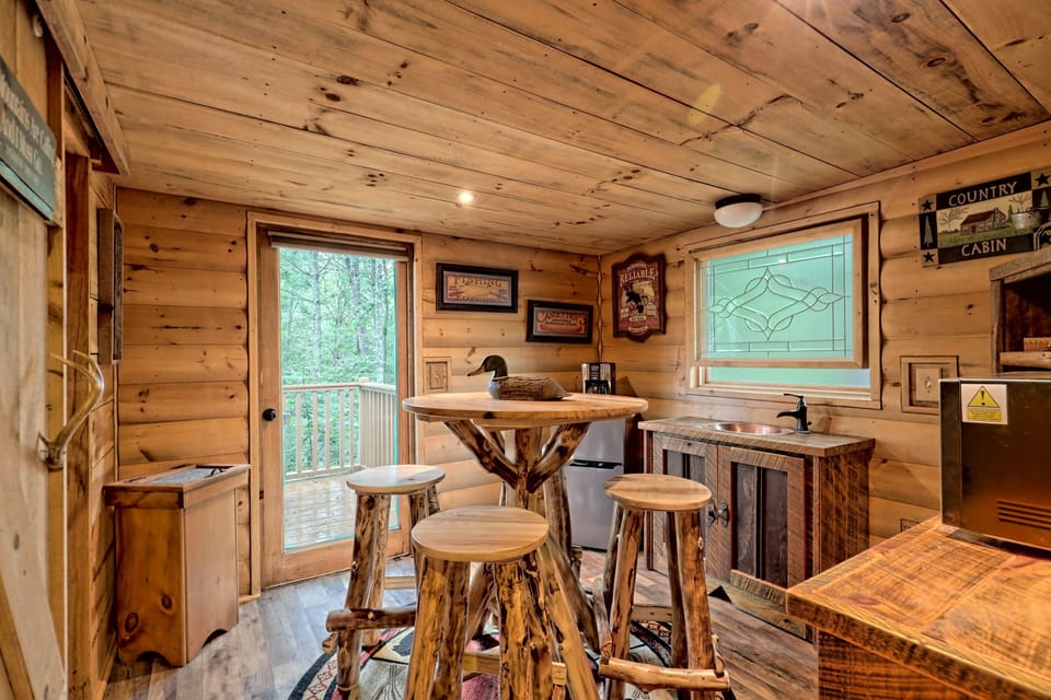 The kitchenette includes a microwave, mini-fridge and keurig style coffee maker.