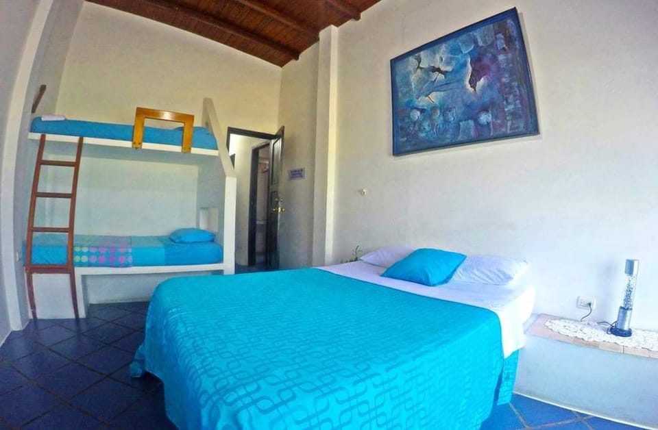 Quadruple Room | Minibar, bed sheets
