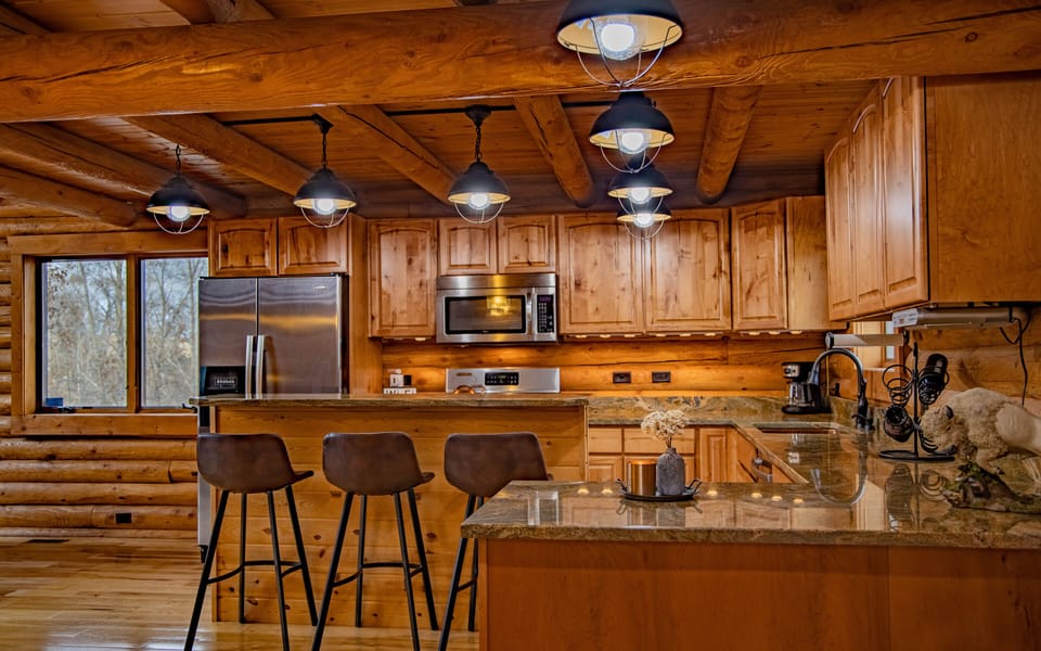 Main entrance into open kitchen with beautiful granite countertops