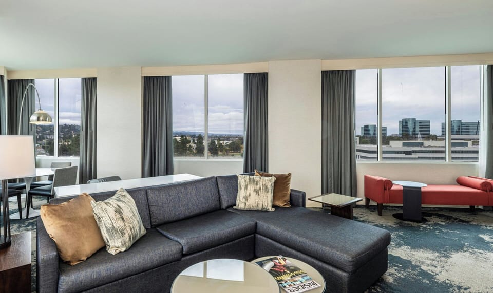 Suite, 1 Bedroom | Living room | 55-inch flat-screen TV with digital channels, TV, streaming services