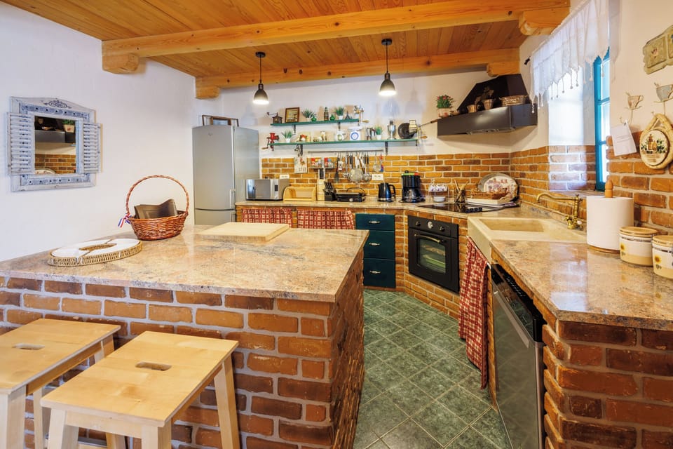 Villa | Private kitchen | Fridge, microwave, oven, stovetop
