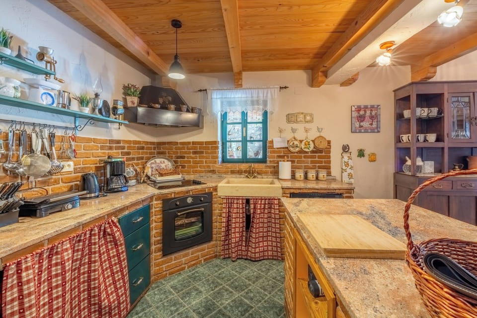 Villa | Private kitchen | Fridge, microwave, oven, stovetop