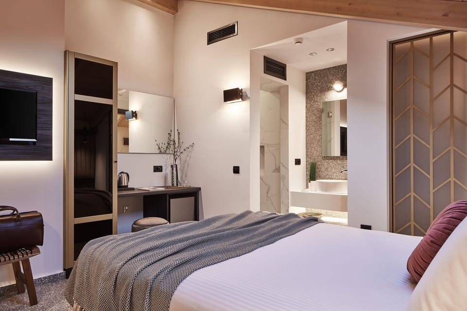 Superior Double Room (The room is located on the loft level and is accessible via stairs) | In-room safe, individually decorated, individually furnished, desk