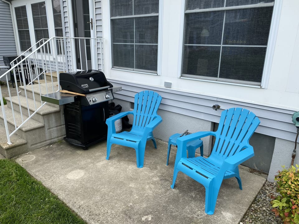 Grill some food on the back patio or enjoy a cold beverage!