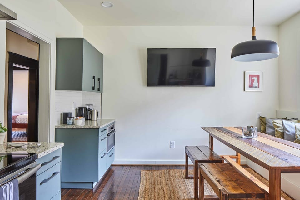 With an open plan and a spacious dining and lounging area, the kitchen serves multiple purposes.