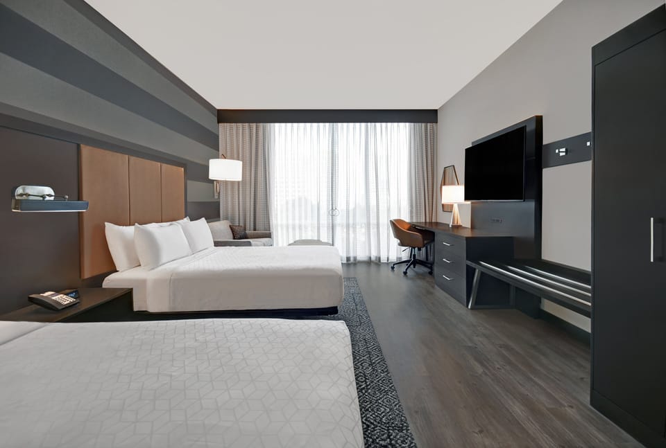 Hypo-allergenic bedding available, in-room safe, blackout drapes