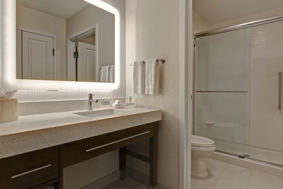Hair dryer, towels, soap, shampoo