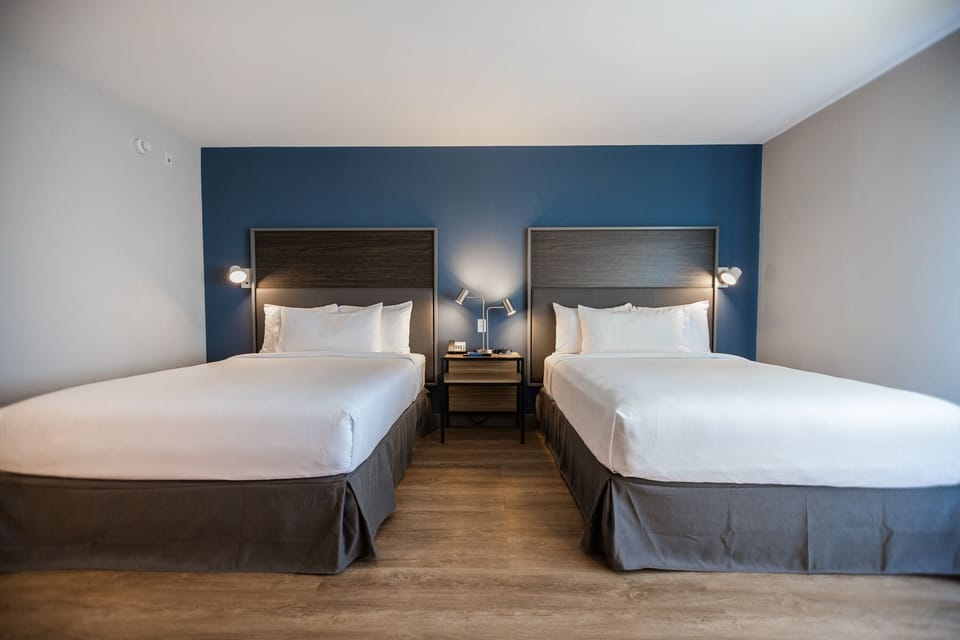 Room, 2 Queen Beds | Desk, laptop workspace, blackout drapes, iron/ironing board