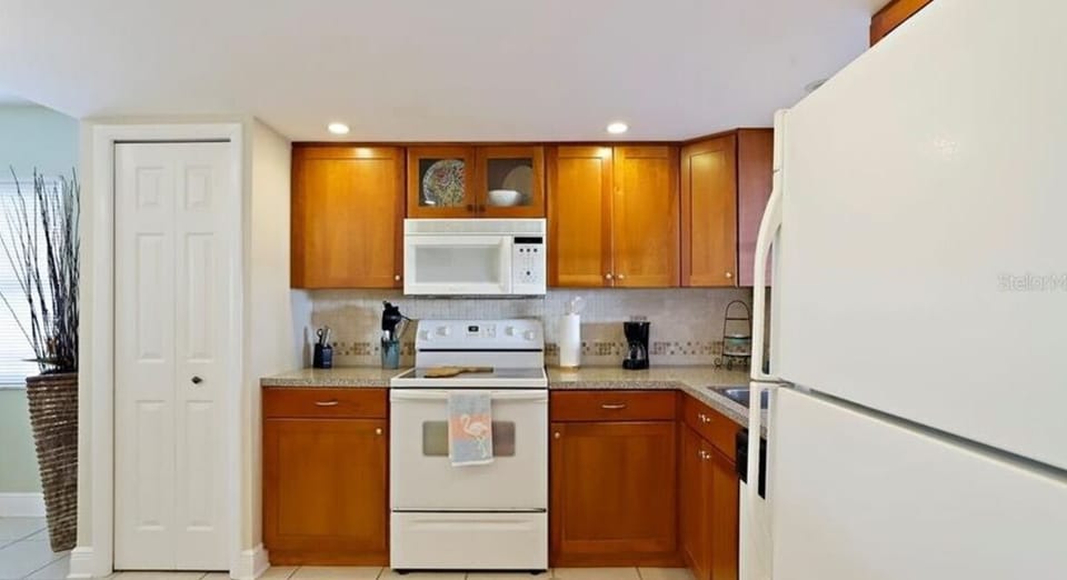 Fully stocked kitchen with lots of storage too! Cook in or go out!
