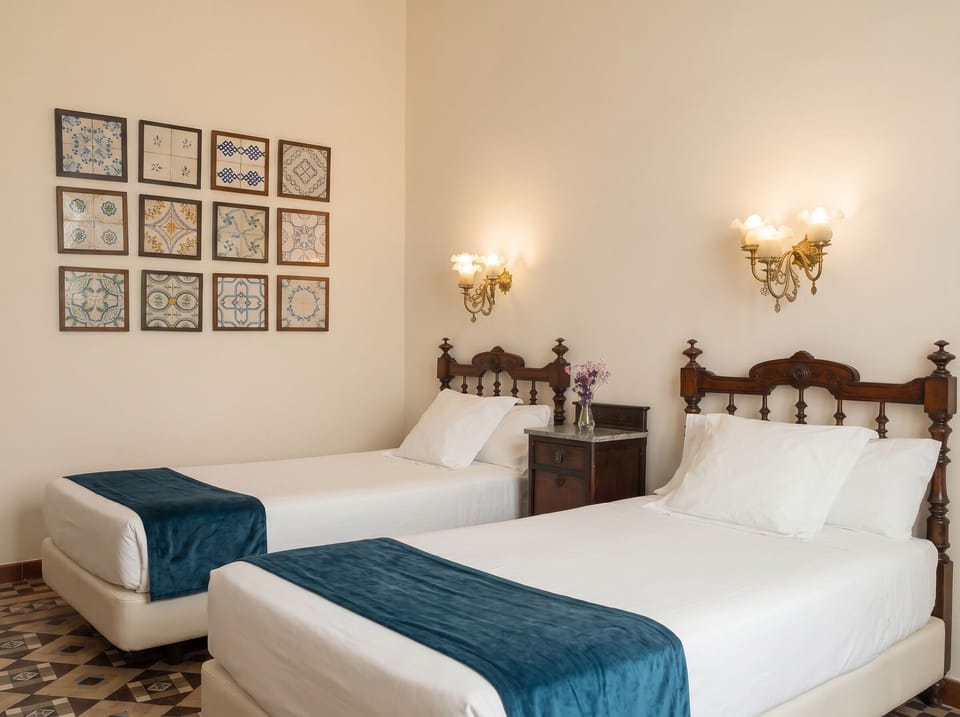 Double or Twin Room | Minibar, in-room safe, free WiFi, bed sheets