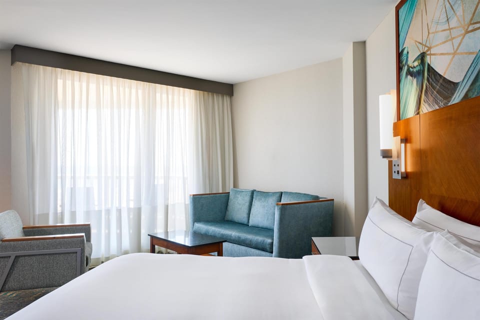 Room, 1 King Bed with Sofa bed, Oceanfront | Pillowtop beds, in-room safe, desk, blackout drapes