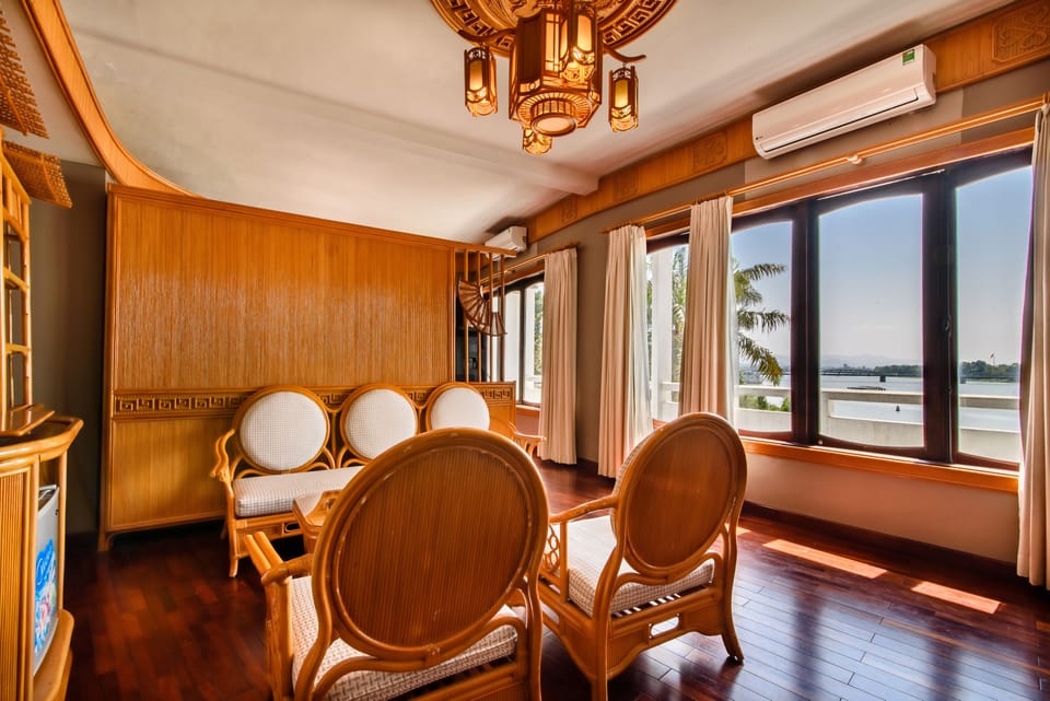 Junior Suite | Living room | 42-inch flat-screen TV with satellite channels