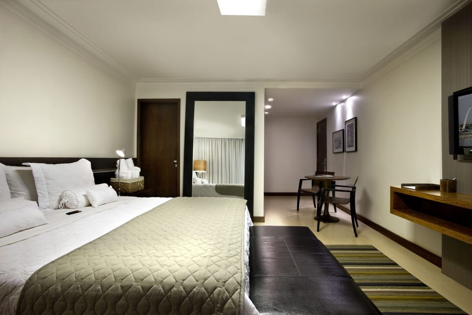 Minibar, desk, blackout drapes, iron/ironing board
