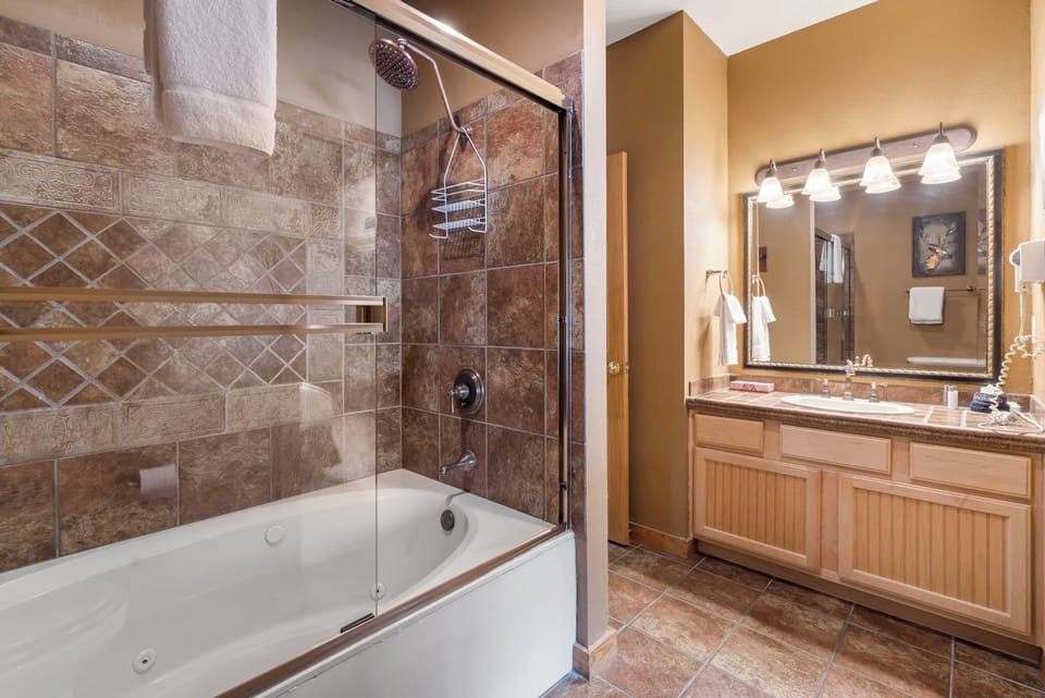 Main Level Bathroom  with Jetted Tub/Shower Combo
