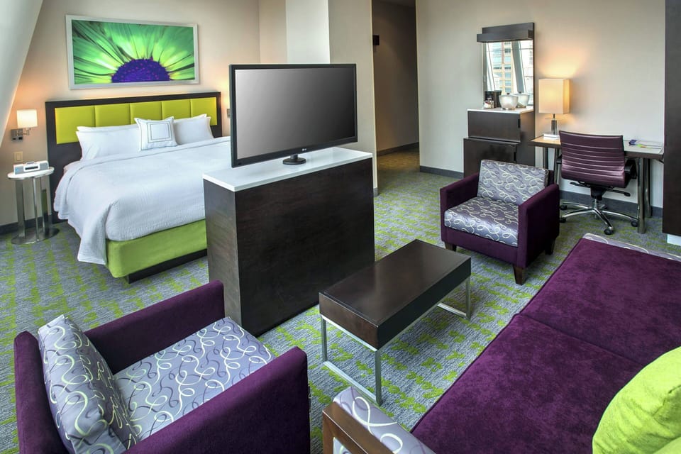 Executive Suite, 1 King Bed, Non Smoking | 1 bedroom, in-room safe, desk, iron/ironing board