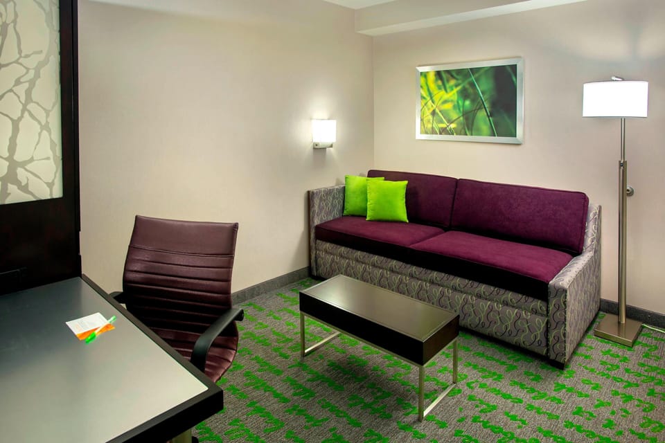 Executive Suite, 1 King Bed, Non Smoking | Living area | 42-inch LCD TV with satellite channels, TV, iPod dock