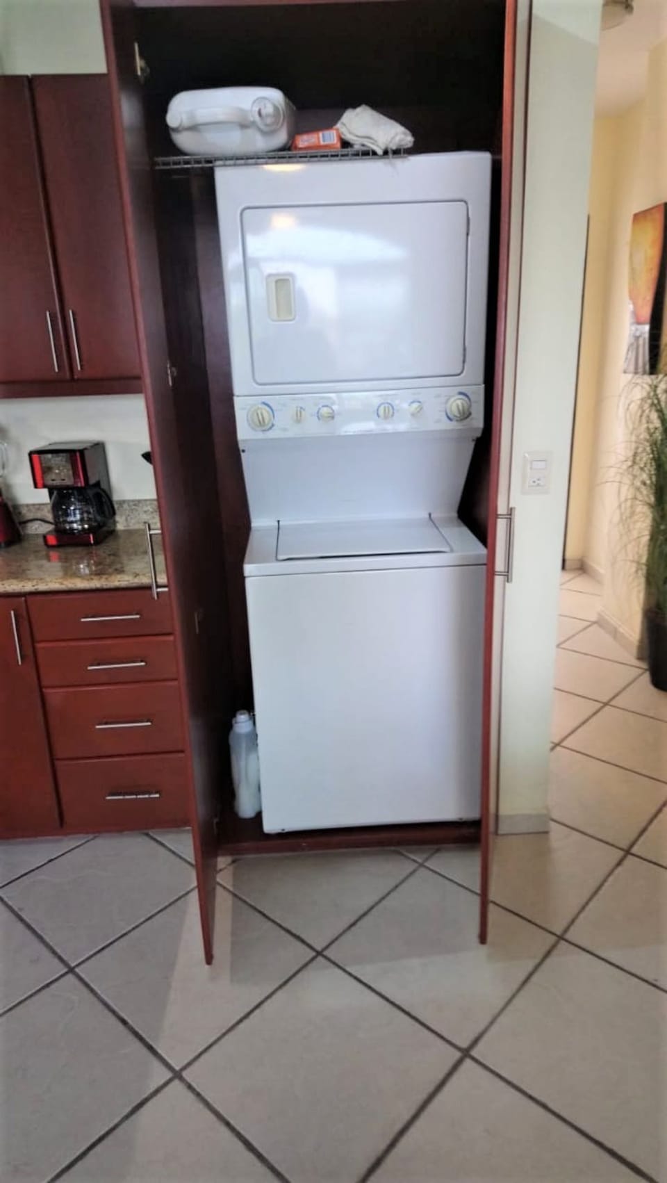 Washer Dryer is in the Kitchen. The Kitchen also has coffee maker, and blender.