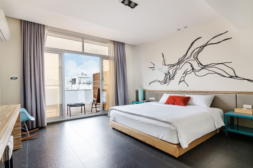 Deluxe Double Room, Terrace | Down comforters, individually decorated, individually furnished, desk